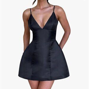 Brand new w/ tags classy black cocktail dress. Adjustable straps. Snatched waist